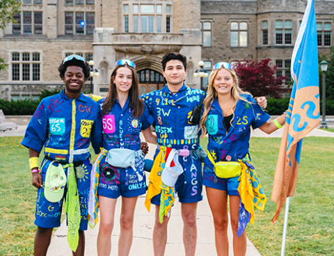 Four Soph members standing out front of UC Tower.